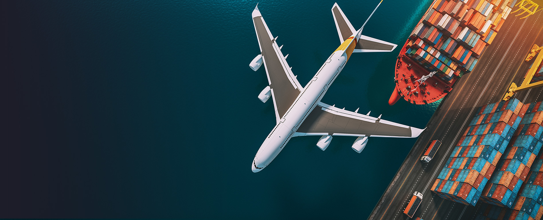Plane and container ship moving cargo